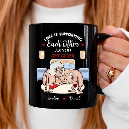 Personalized Old Couple Black Ceramic Mug - Gift Idea For Couple - Love Is Supporting Each Other As You Get Older
